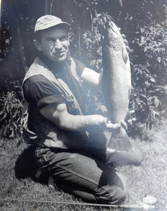 Ed Shenk poses with a behemoth brown trout caught in the Letort. (Photo by Glad Fox, used with permission from the PA Fly Fishing Museum.)