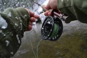 fly reel with hands