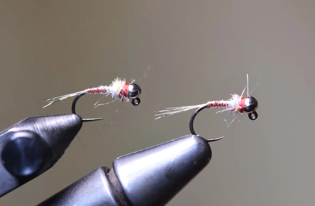 Fishing flies in vise