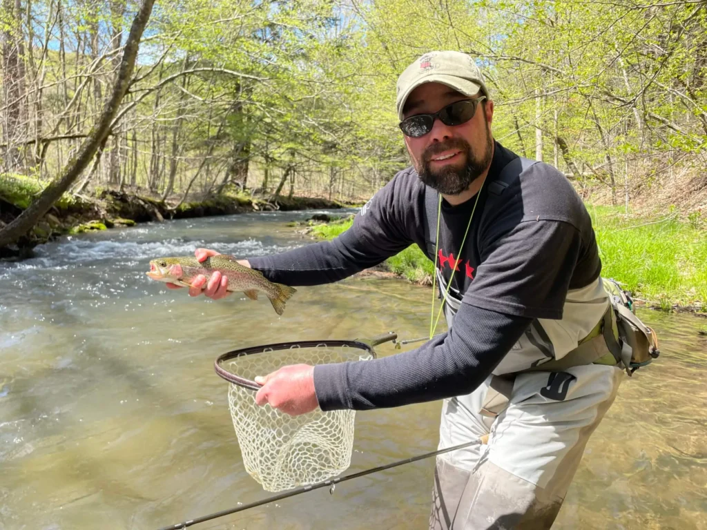 angler holding trout