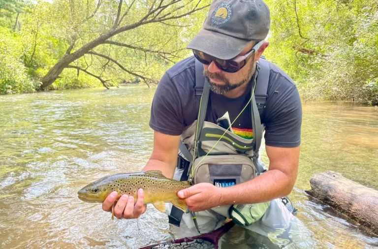 man holding fish