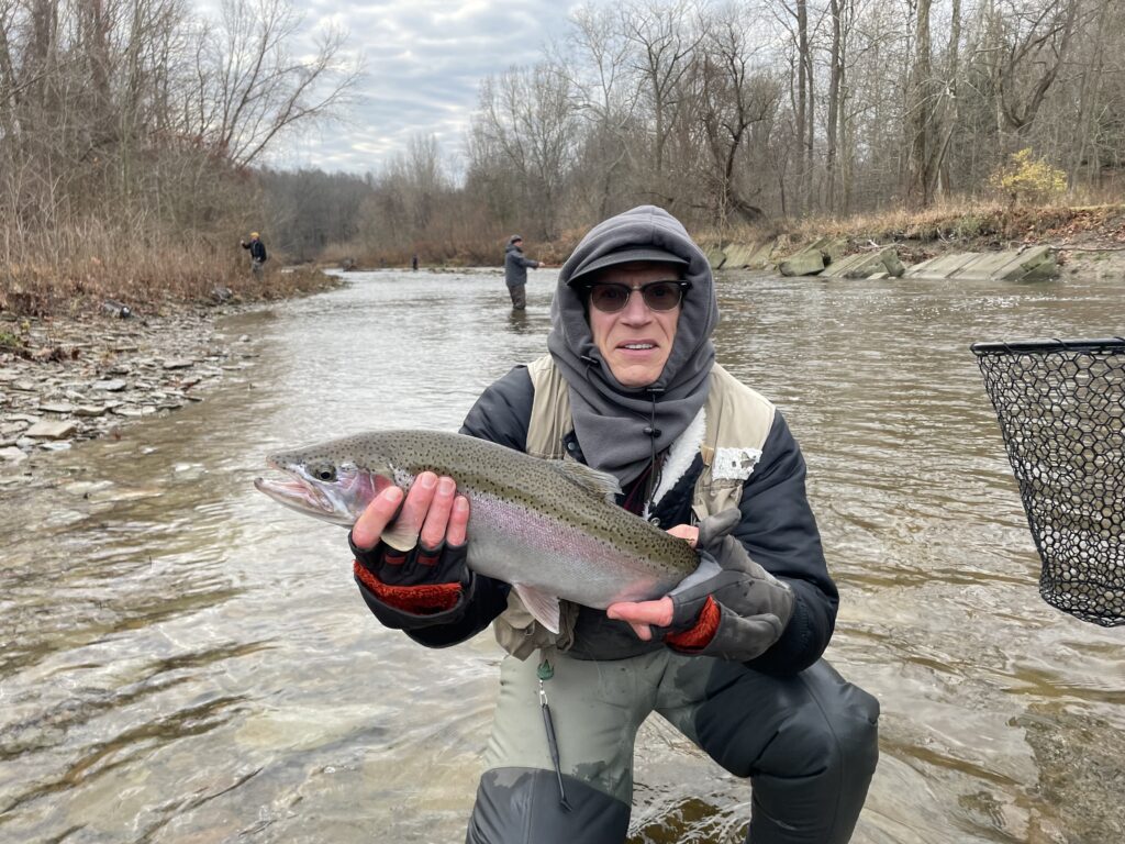 man holding steelhead