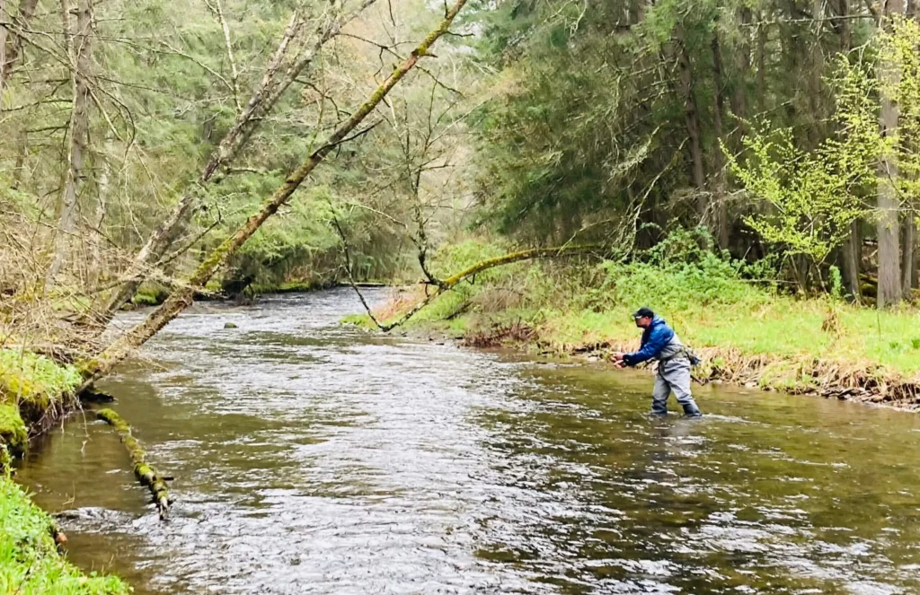 man fishing a stream