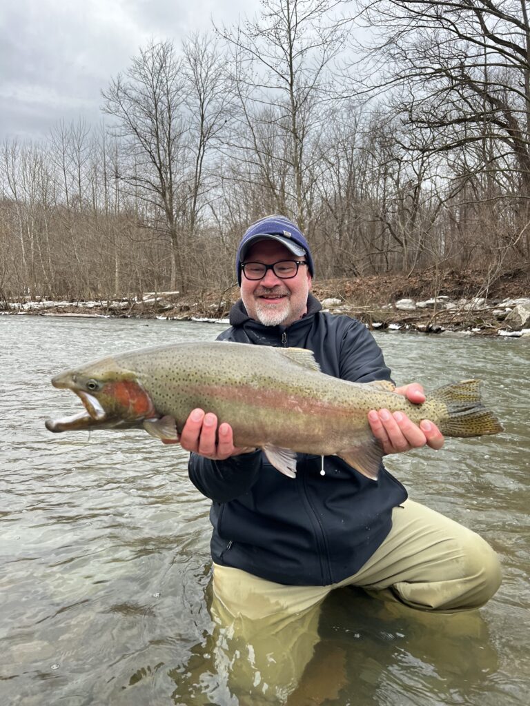 Chad Jensen with steelhead.