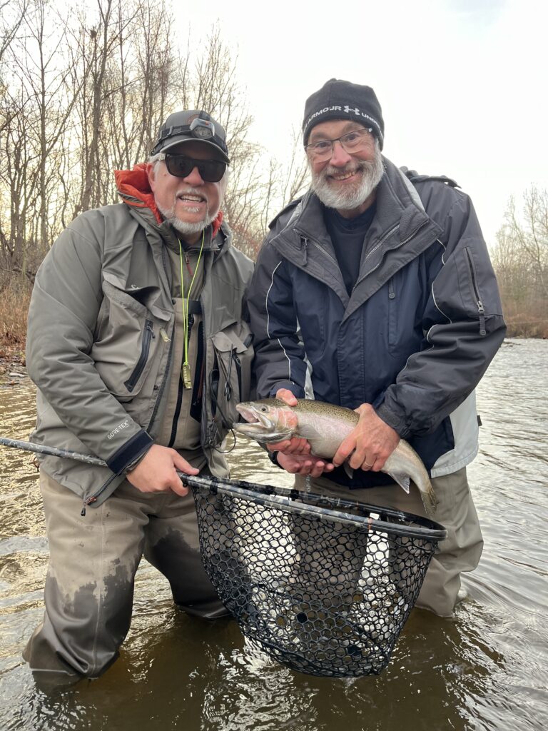 Two guys holding a fish