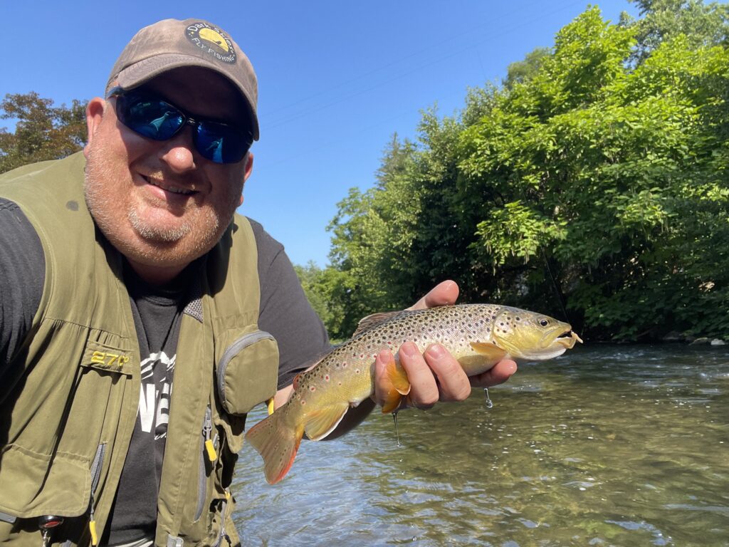 man holding trout