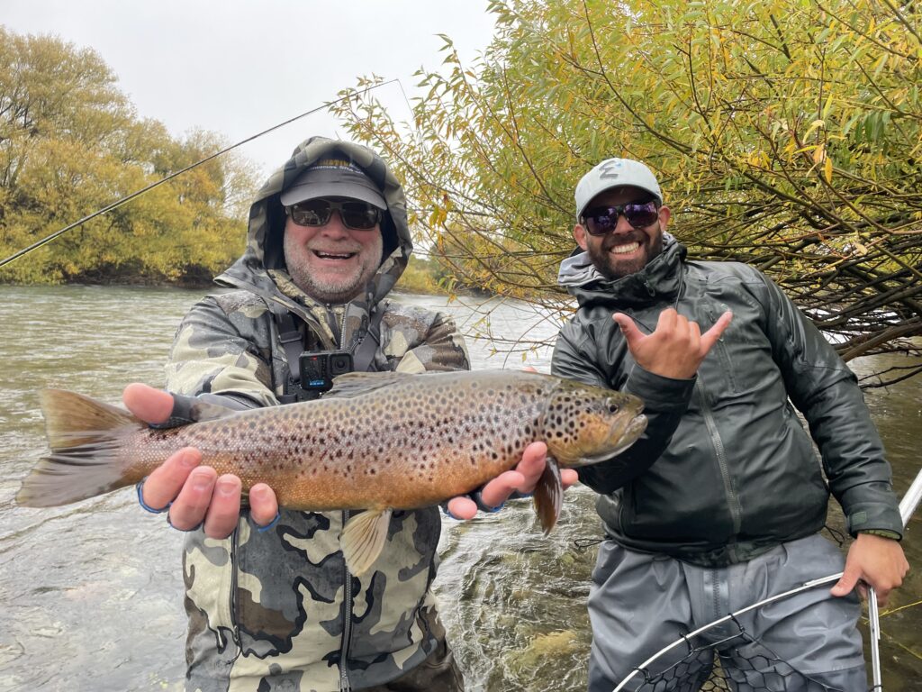 two men with a trout